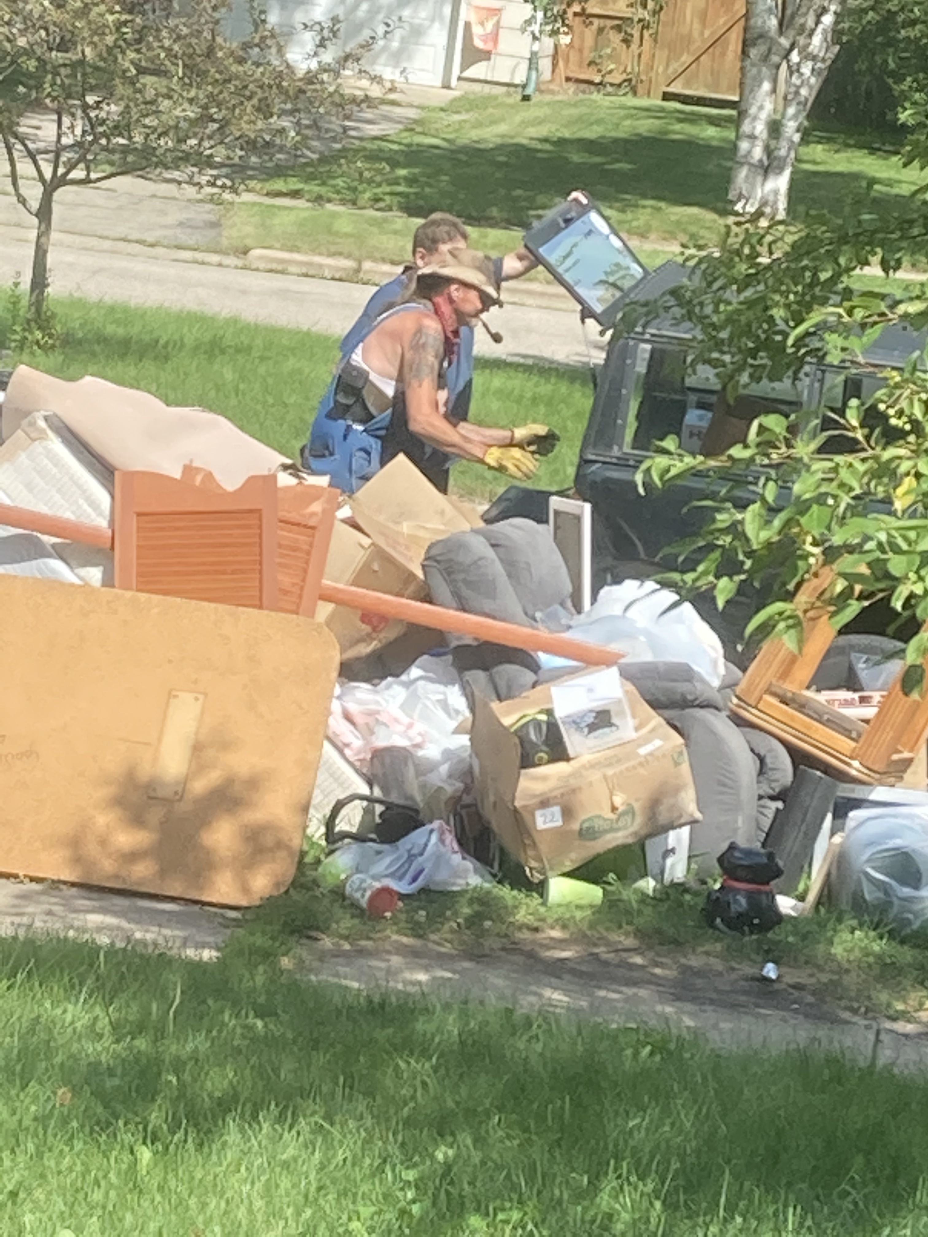 Strange man taking from our garbage